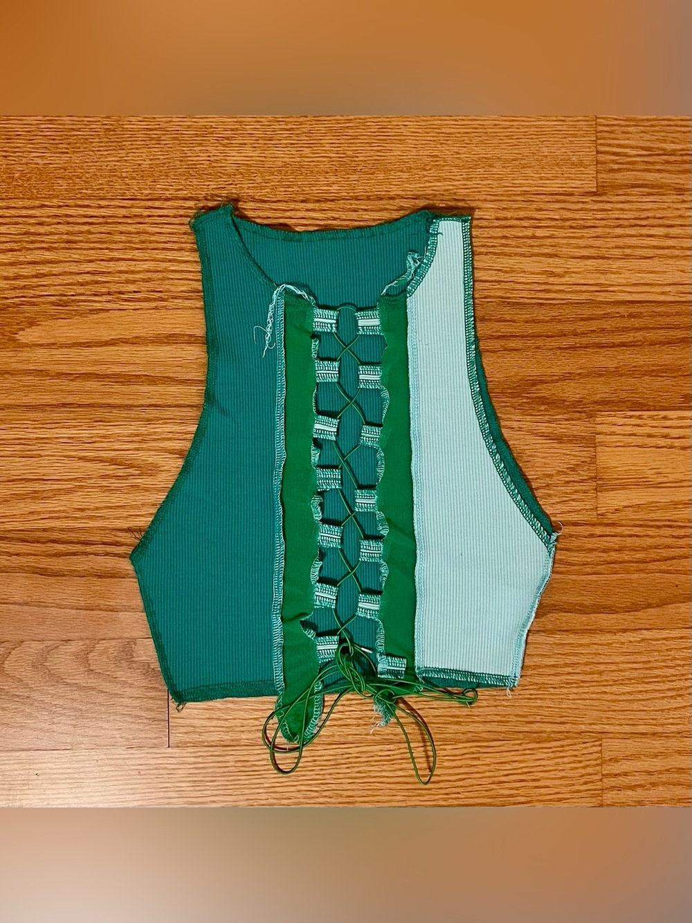 Green cropped tank with lace-up front